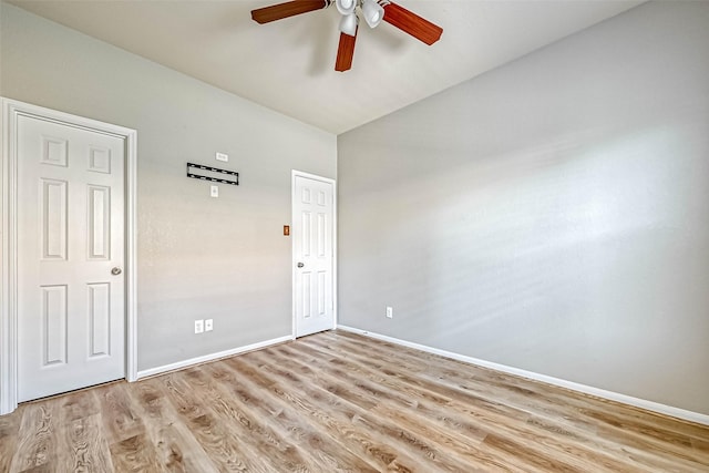 5006 Forest Hurst Gln, Spring, TX 77373 - spare room featuring baseboards, ceiling fan, and light wood-style floors