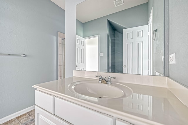 5006 Forest Hurst Gln, Spring, TX 77373 - bathroom with vanity and baseboards