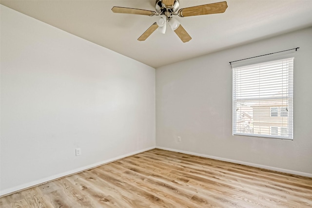 5006 Forest Hurst Gln, Spring, TX 77373 - spare room with light wood-style floors, baseboards, and a ceiling fan