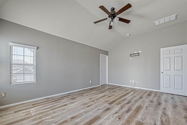 5006 Forest Hurst Gln, Spring, TX 77373 - empty room featuring vaulted ceiling, a ceiling fan, light wood-style floors, and baseboards