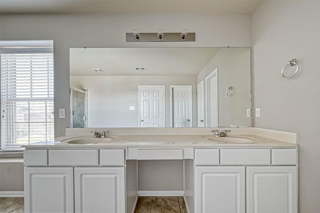 5006 Forest Hurst Gln, Spring, TX 77373 - full bath featuring a stall shower, double vanity, and tile patterned flooring