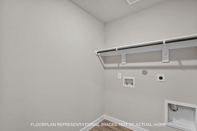 4981 Perennial Ln, La Marque, TX 77568 - laundry room featuring electric dryer hookup, hookup for a gas dryer, hookup for a washing machine, baseboards, and wood finished floors