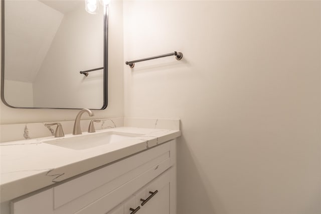 9850 Pagewood Ln Unit 909, Houston, TX 77042 - bathroom with vanity and lofted ceiling
