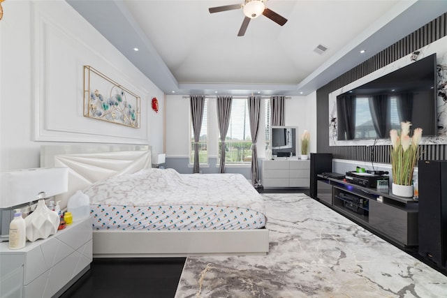 8007 Clearwater Glen Ct, Richmond, TX 77407 - bedroom featuring ceiling fan, lofted ceiling, and a tray ceiling