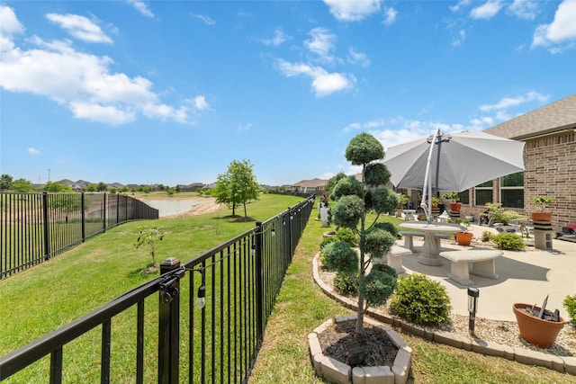 8007 Clearwater Glen Ct, Richmond, TX 77407 - view of yard with a water view and a patio area