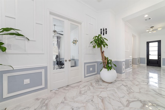 8007 Clearwater Glen Ct, Richmond, TX 77407 - foyer entrance featuring ornamental molding, baseboards, french doors, and light marble finish floors