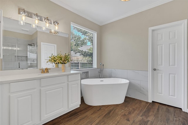 2833 Everett Dr, Friendswood, TX 77546 - full bath featuring a shower stall, ornamental molding, vanity, tile walls, and a freestanding bath