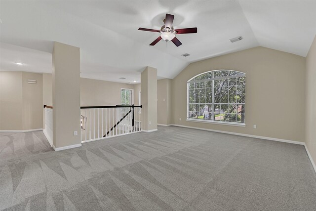 2833 Everett Dr, Friendswood, TX 77546 - empty room with carpet, ceiling fan, lofted ceiling, and baseboards