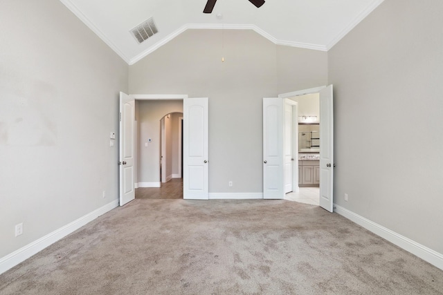 29407 Amber Meadows Ct, Katy, TX 77494 - unfurnished bedroom with crown molding, carpet, high vaulted ceiling, baseboards, and connected bathroom