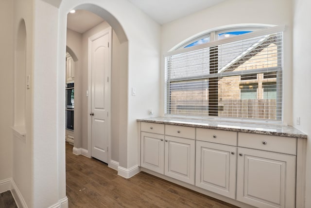 29407 Amber Meadows Ct, Katy, TX 77494 - bathroom with baseboards and wood finished floors