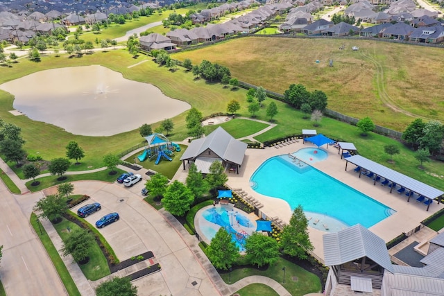 29407 Amber Meadows Ct, Katy, TX 77494 - aerial view of residential area with a pool and a large body of water