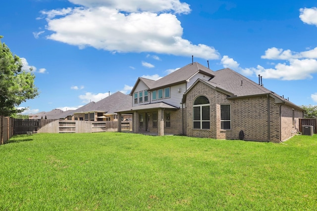 29407 Amber Meadows Ct, Katy, TX 77494 - rear view of house with brick siding, cooling unit, and roof with shingles