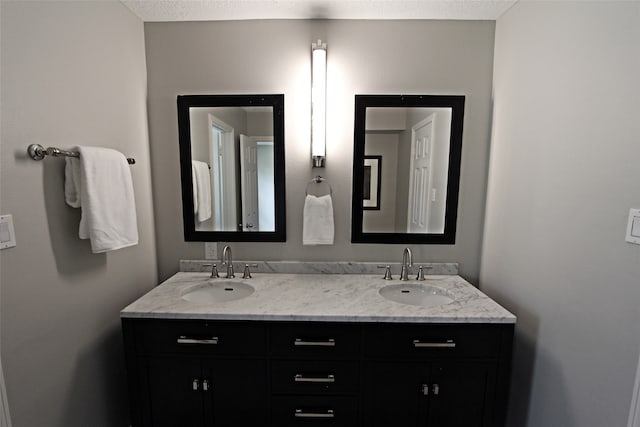 full bathroom featuring double vanity