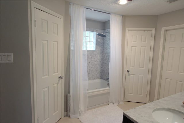 bathroom with shower / bath combination with curtain and vanity