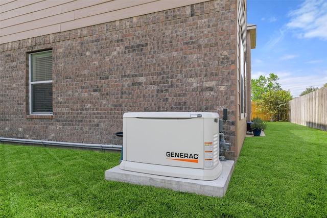 1078 Lasso Ct, Alvin, TX 77511 - exterior view of a power unit, fence, gas meter, and brick siding