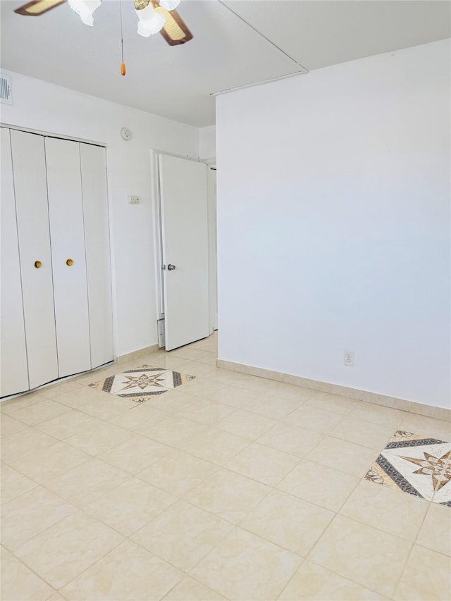 6405 Westward St Unit 96, Houston, TX 77081 - unfurnished bedroom featuring a closet, a ceiling fan, and baseboards