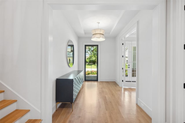1221 Lamonte Ln, Houston, TX 77018 - entrance foyer featuring light wood finished floors, baseboards, stairs, and a tray ceiling