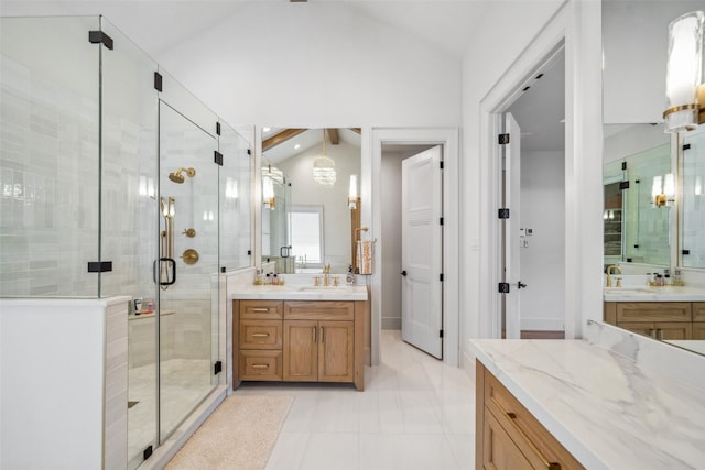 1221 Lamonte Ln, Houston, TX 77018 - full bath with lofted ceiling, a shower stall, two vanities, and recessed lighting