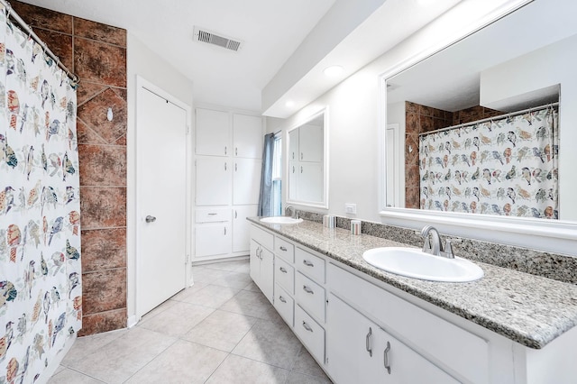 22331 Unicorns Horn Ln, Katy, TX 77449 - full bathroom featuring tile patterned floors, double vanity, a shower with shower curtain, and recessed lighting