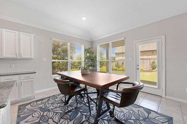 16114 Lake Amistad Pl, Cypress, TX 77433 - dining room featuring light tile patterned flooring, ornamental molding, and baseboards