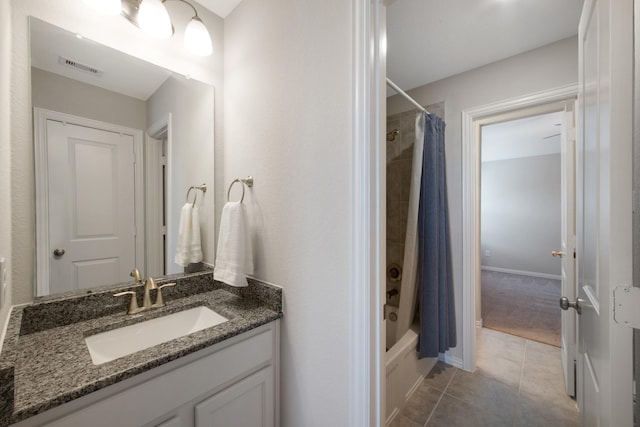 16114 Lake Amistad Pl, Cypress, TX 77433 - bathroom with tile patterned floors, vanity, and shower / tub combo with curtain