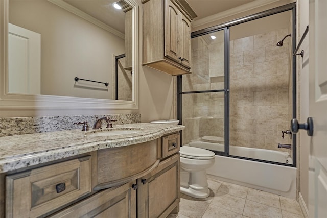 61 Parkgate, Shenandoah, TX 77381 - bathroom with crown molding, toilet, vanity, bath / shower combo with glass door, and tile patterned floors