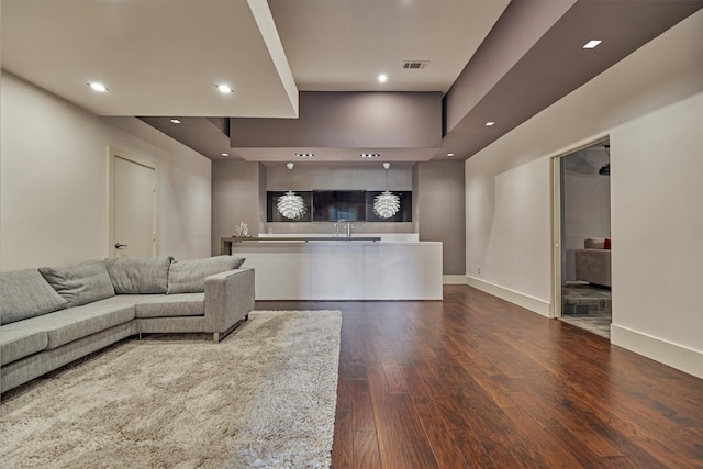 61 Parkgate, Shenandoah, TX 77381 - living area featuring recessed lighting, dark wood-style flooring, and baseboards