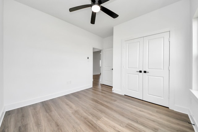 6273 Rd 5503, Cleveland, TX 77327 - unfurnished bedroom with a closet, light wood-style floors, baseboards, and ceiling fan