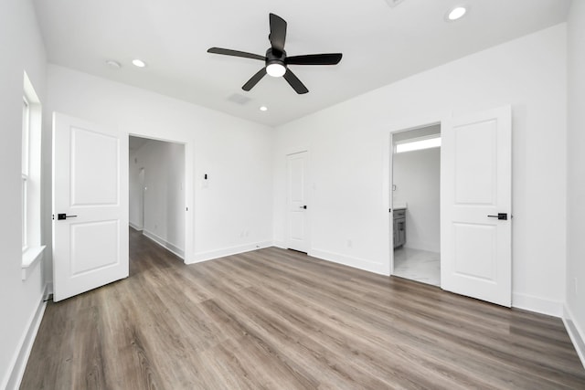 6273 Rd 5503, Cleveland, TX 77327 - unfurnished bedroom featuring wood finished floors, baseboards, recessed lighting, connected bathroom, and a ceiling fan