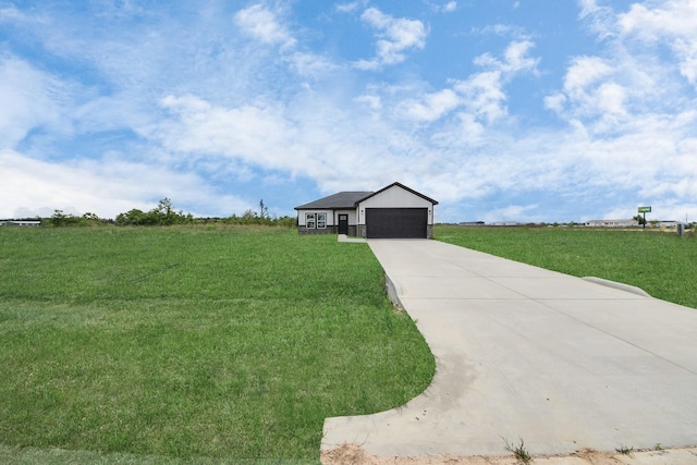 6273 Rd 5503, Cleveland, TX 77327 - ranch-style house featuring a front yard, concrete driveway, and an attached garage