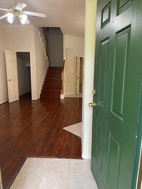 2710 Grants Lake Blvd Unit S4, Sugar Land, TX 77479 - foyer with stairs, wood finished floors, baseboards, and ceiling fan