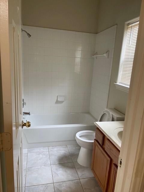 2710 Grants Lake Blvd Unit S4, Sugar Land, TX 77479 - full bathroom with vanity, shower / bath combination, toilet, and tile patterned flooring