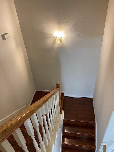 2710 Grants Lake Blvd Unit S4, Sugar Land, TX 77479 - stairway featuring wood finished floors