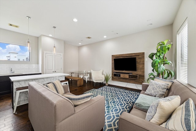 2805 Blodgett St Unit C, Houston, TX 77004 - living area with dark wood-style floors and recessed lighting
