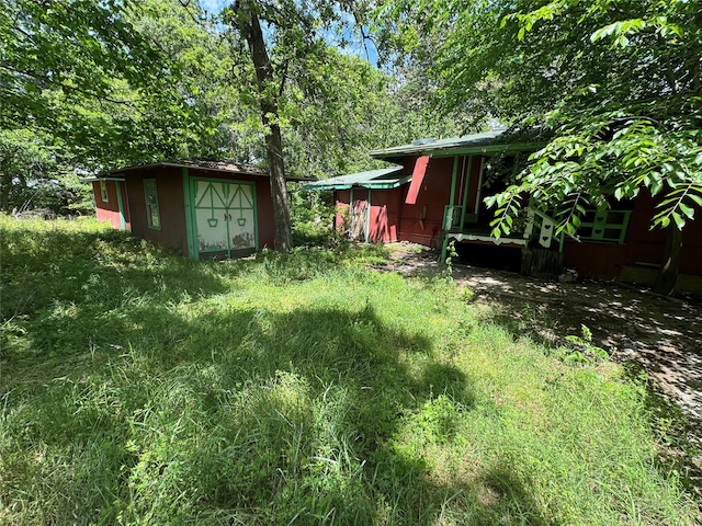 24532 Tyrone, Hempstead, TX 77445 - view of yard featuring a storage shed and an outbuilding