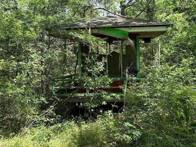 24532 Tyrone, Hempstead, TX 77445 - view of outdoor structure featuring a view of trees