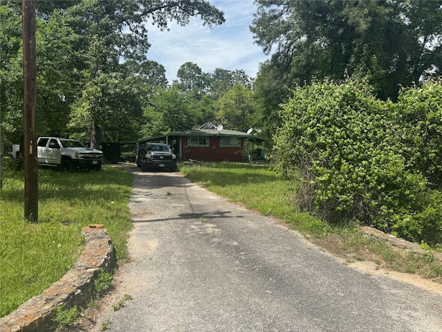 24532 Tyrone, Hempstead, TX 77445 - view of asphalt driveway