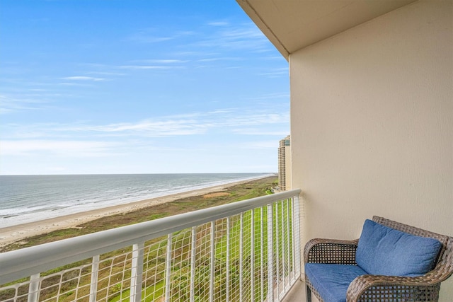 1401 E Beach Dr Unit 1205, Galveston, TX 77550 - balcony with view of water and beach