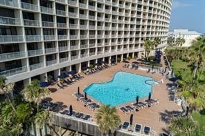 1401 E Beach Dr Unit 1205, Galveston, TX 77550 - community pool with a patio