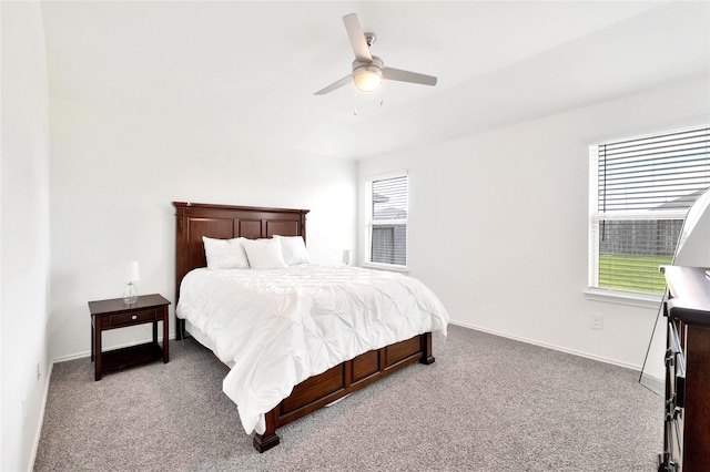21614 Gusto Glen Ln, Katy, TX 77449 - bedroom with carpet flooring, multiple windows, and a ceiling fan