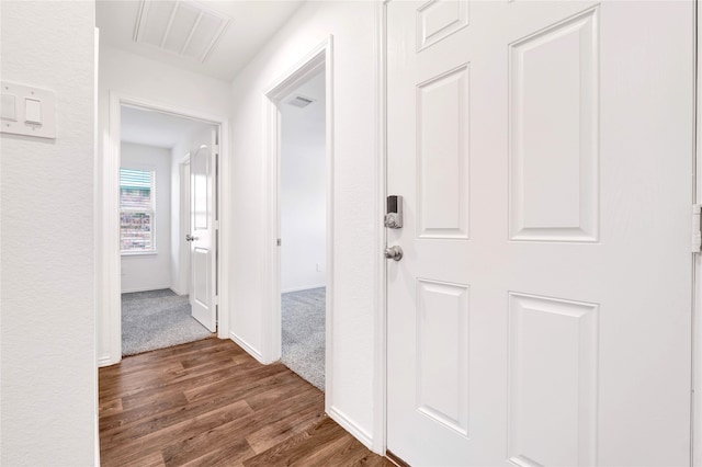 21614 Gusto Glen Ln, Katy, TX 77449 - corridor featuring wood finished floors and baseboards