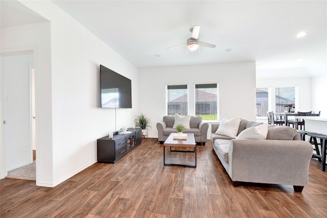 21614 Gusto Glen Ln, Katy, TX 77449 - living room with wood finished floors, ceiling fan, and baseboards