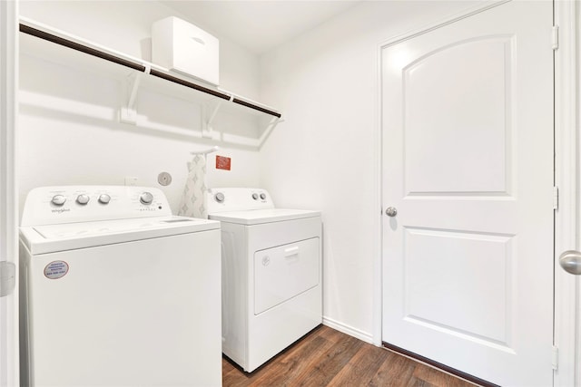 21614 Gusto Glen Ln, Katy, TX 77449 - laundry area with washer and clothes dryer and dark wood-type flooring