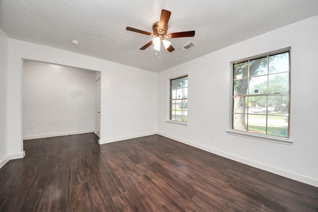 9223 Eaglewood Glen Trl, Houston, TX 77083 - empty room with wood finished floors, ceiling fan, and baseboards