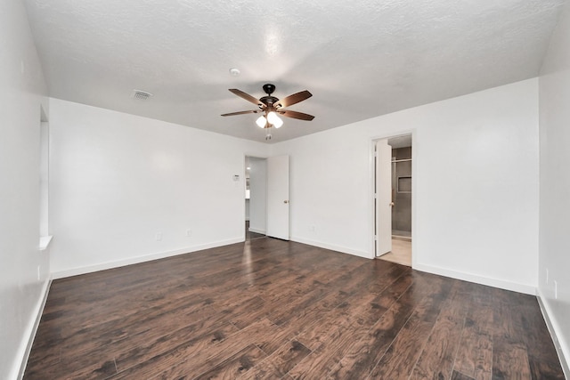 9223 Eaglewood Glen Trl, Houston, TX 77083 - unfurnished bedroom featuring wood finished floors, baseboards, a ceiling fan, and ensuite bathroom