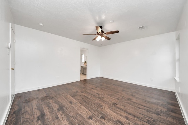 9223 Eaglewood Glen Trl, Houston, TX 77083 - unfurnished room with ceiling fan, dark wood finished floors, baseboards, and a smoke detector
