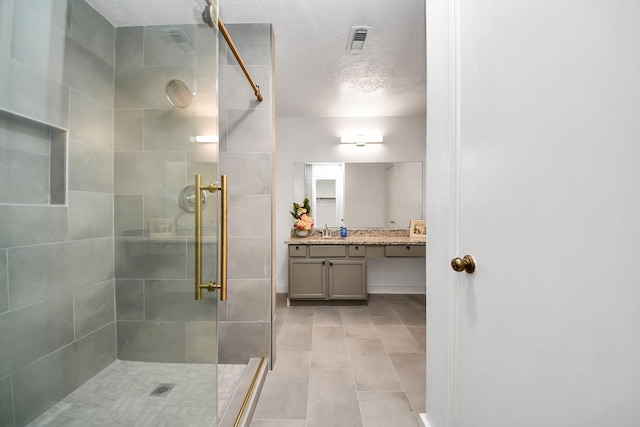 9223 Eaglewood Glen Trl, Houston, TX 77083 - bathroom featuring a shower stall, vanity, and tile patterned flooring