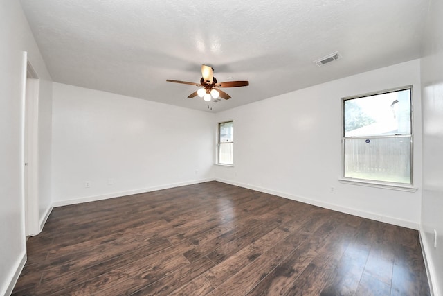 9223 Eaglewood Glen Trl, Houston, TX 77083 - spare room with ceiling fan, dark wood-type flooring, and baseboards