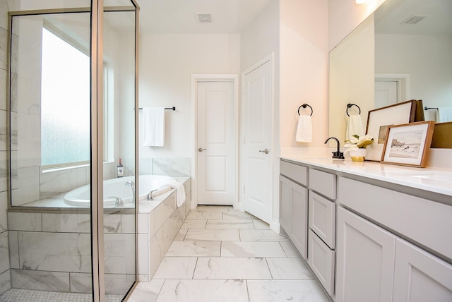 2804 Sable Creek Ln, Pearland, TX 77584 - bathroom featuring marble look tiles, a garden tub, double vanity, and a shower with door