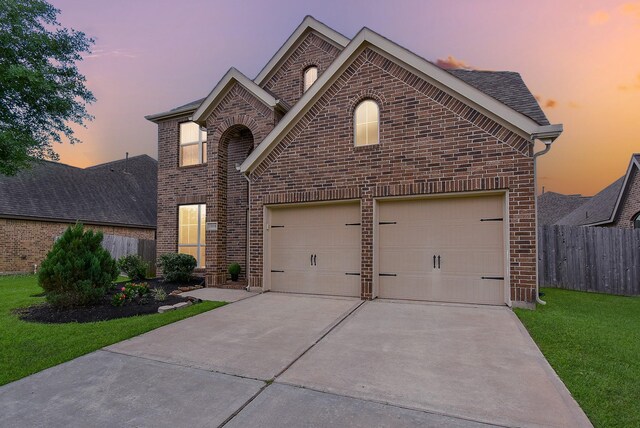 2804 Sable Creek Ln, Pearland, TX 77584 - view of front facade featuring brick siding, concrete driveway, and roof with shingles